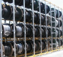 Racks for the cable-laid drums